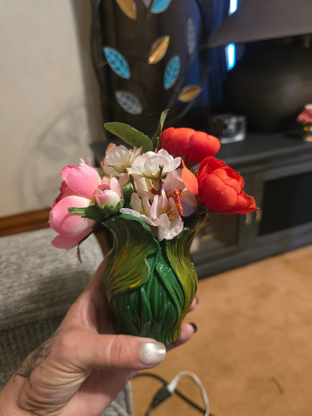 Elegance in Relief: Vase of Leaves