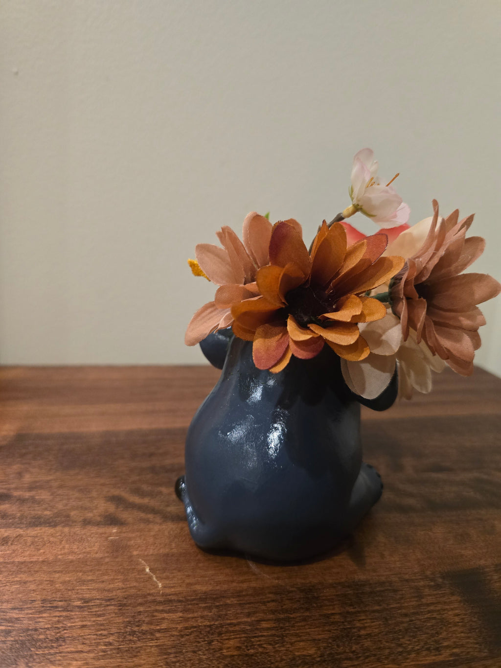 Mini Elephant with Artificial flowers.