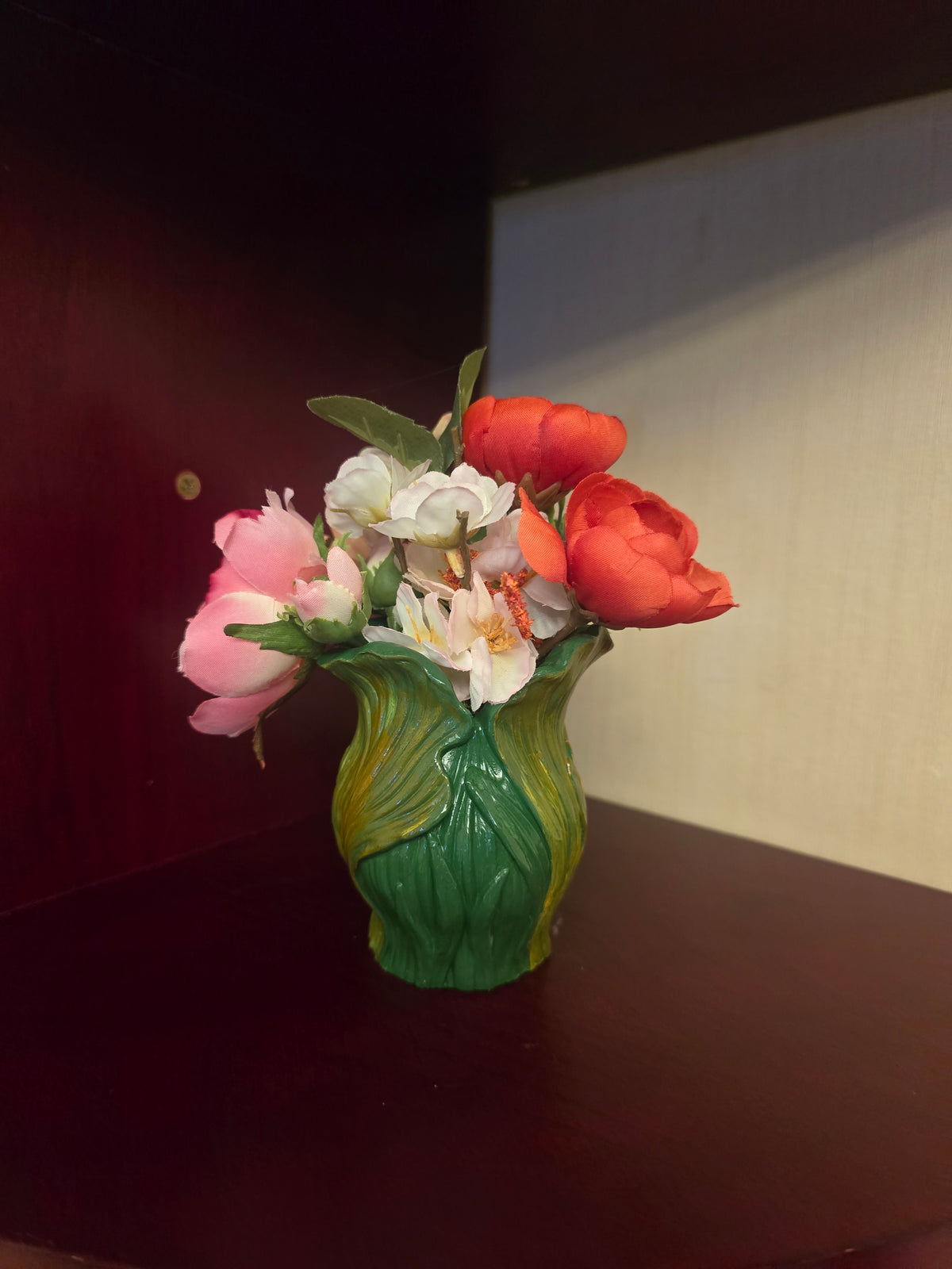 Elegance in Relief: Vase of Leaves